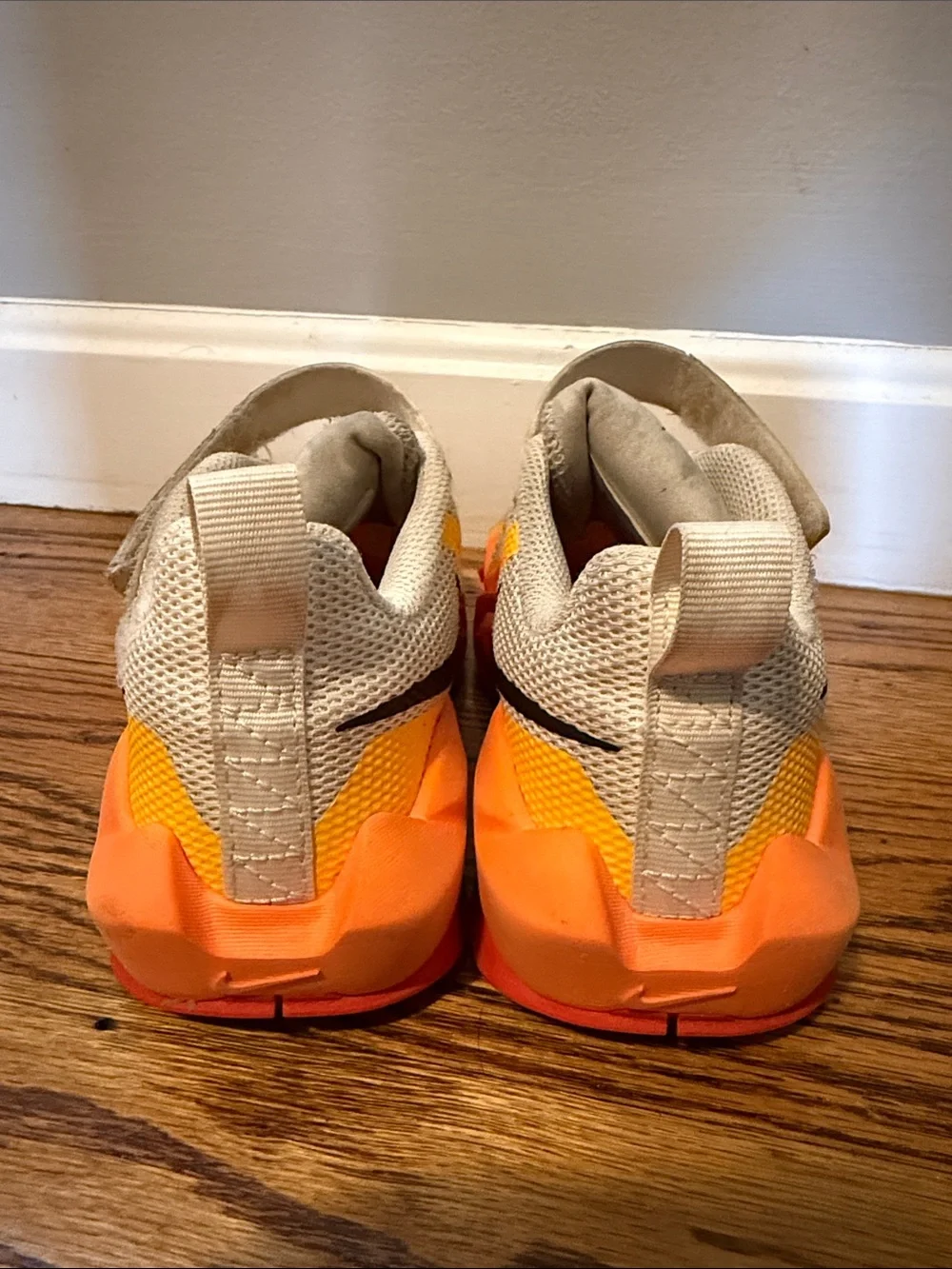 Nike Kids' Gray Sneakers with Orange and Red Lightning Accents